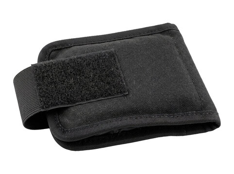 Black wrist weight ankle pouch with adjustable velcro strap for fitness strength training and tactical utility gear isolated on dark background for exercise studio workout equipment accessory