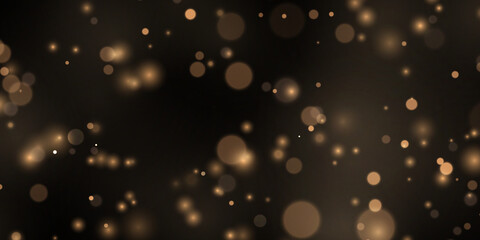 Fine golden particles scatter like sparkling confetti over dark space. Warm luminous bokeh creates festive luxury. Perfect for Christmas banners and cards. © Freesstock