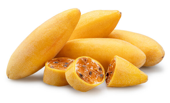 Curubas or banana passion fruits and fruit slices showing the juicy pulp and black seeds on white background. File contains clipping path.