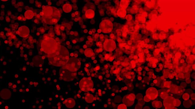 Red bokeh circles and particles construct a moody overlay layer. Holiday party background wallpapers adopt red bokeh. Red bokeh circles float gracefully on dark.