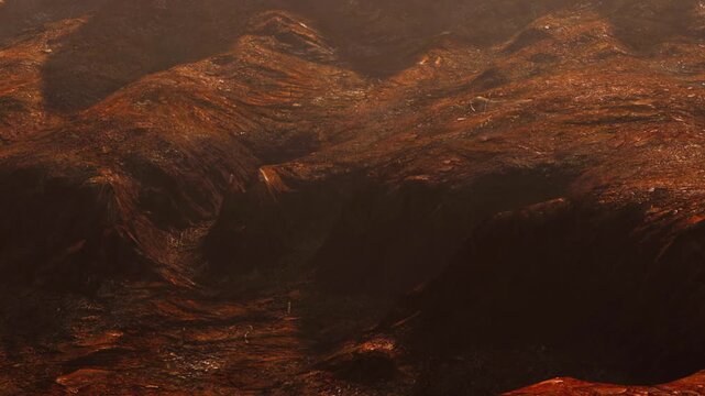 The scene shows a vast landscape with steep hills and rocky ground. The colors are earthy and warm. There is no visible life, and the area appears dry and remote.