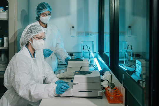 Scientists Using Moisture Analyzers in Pharmaceutical Laboratory Quality Control Research