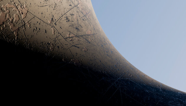Close-up of scratched and worn curved metal surface with texture