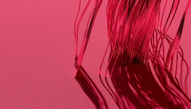 Close-up of red threads casting detailed shadows on a textile surface