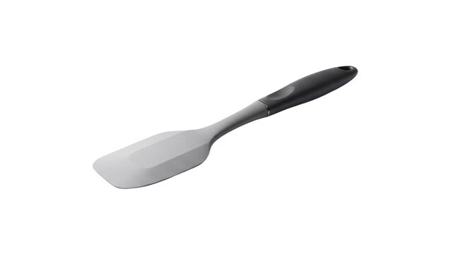 Stainless steel kitchen spatula with black ergonomic handle isolated on transparent background, modern cooking turner utensil cutout for food prep