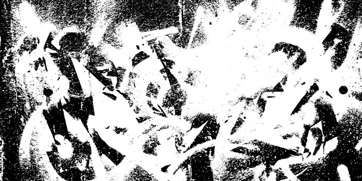 Abstract grunge texture with chaotic white spray paint splatters on dark wall background