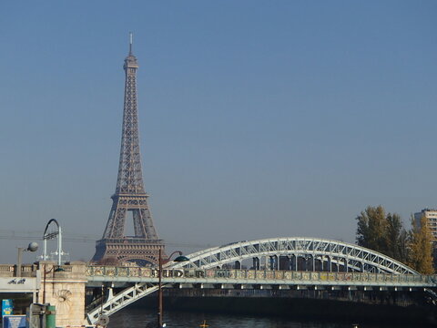Eiffel Tower and Pont d'Iena bridge over the Seine River in Paris