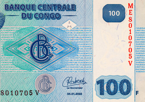 100 Congolese Francs banknote showing the Central Bank of Congo emblem and security guilloche patterns. Money of Africa.