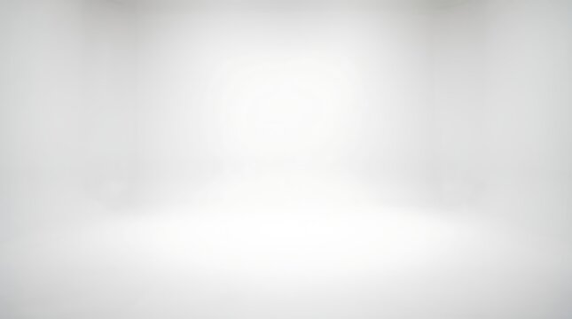 A bright, softly lit empty studio with a subtle spotlight effect, creating a clean and versatile backdrop for creative projects.