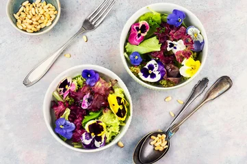 Healthy floral salad with mixed greens and edible blossoms. © nikolaydonetsk