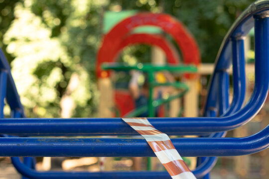 A public playground has been cordoned off with tape to prevent use due to high winds and possible falling trees.