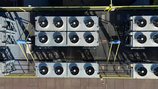 Close-Up Aerial View of AI Data Centre Rooftop HVAC Cooling Fans and Server Chillers