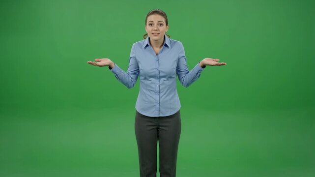 Confused Young Woman Shrugs Shoulders with Palms Up on Green Screen.