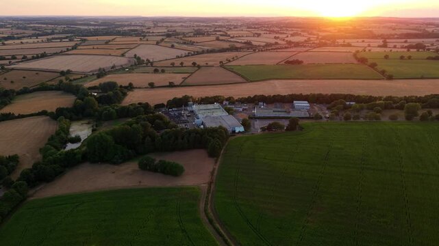 Aerial view of a rural science and technology park at golden sunset in Northamptonshire UK