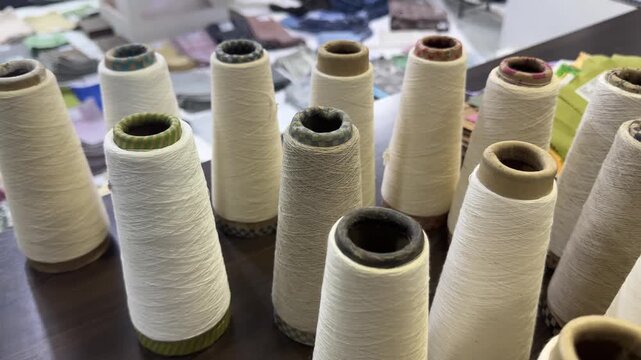 Rows of cotton yarn cones in a textile factory