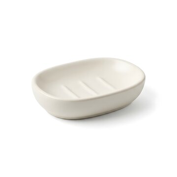 Empty white ceramic soap dish isolated on a clean white background