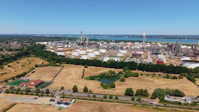 High Angle Aerial Perspective of Industrial Petrochemical Refinery and Fuel Depot Infrastructure on south coast of the UK