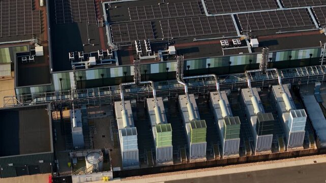 Close Up Aerial View of HVAC Server Cooling Units and Chiller Fans on Hyperscale Data Center in the UK