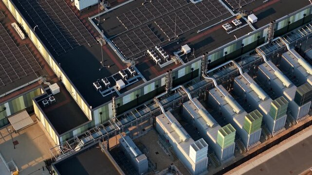 Close Up Aerial View of HVAC Server Cooling Units and Chiller Fans on Hyperscale Data Center in the UK