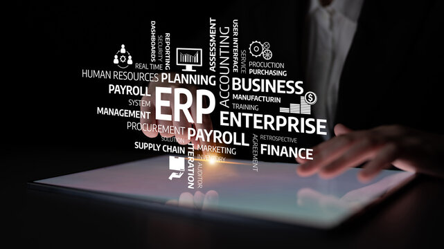 A business professional uses a digital tablet displaying crucial ERP concepts, emphasizing enterprise resource management, planning, and organizational efficiency. Tessel