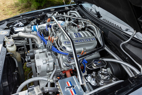 Newcastle-under-Lyme, Staffordshire-united kingdom March, 09, 2025 Detailed Close-Up Of A 3.8 Fuel Injected V6 Engine In A Classic Mustang Engine Bay