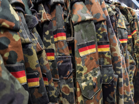 German Military Camouflage Uniforms Displayed for Sale