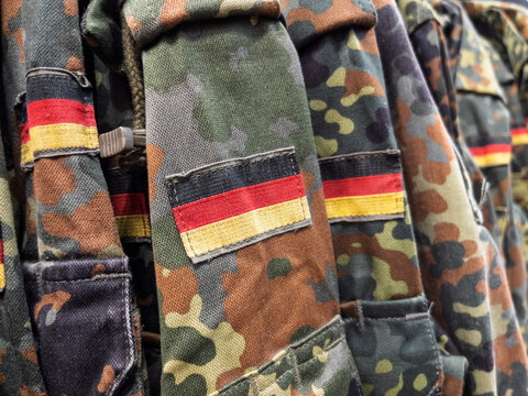 German Army Camouflage Uniforms Displayed for Sale