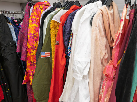 Carnival Costumes Displayed in Clothing Store Rack