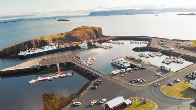 Majestic drone shot of Stykkisholmur village with ocean and