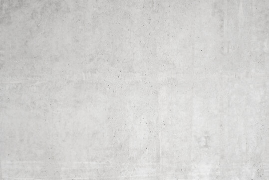 Abstract background of a gray concrete wall. Smooth and clear surface. Grunge style, polished cement. For outdoor use. Cement texture, cement surface.