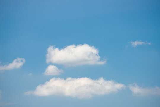 beautiful blue sky and white fluffy cloud horizon outdoor for background.