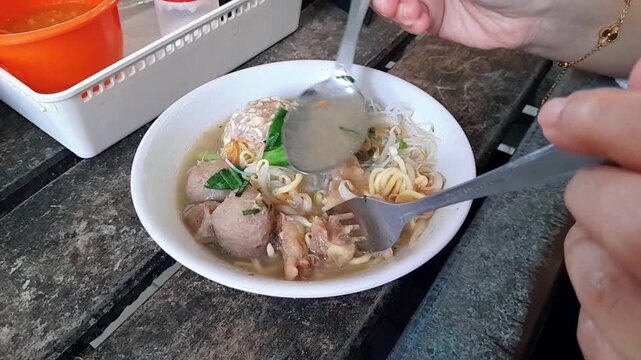 Close up of a Mie Bakso (meatballs with noodle soup) one of the most Indonesia popular street food