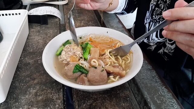 Close up of a Mie Bakso (meatballs with noodle soup) one of the most Indonesia popular street food
