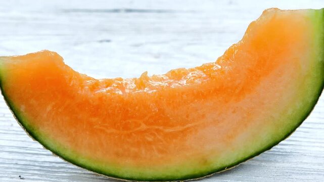 Fresh Melon on White Wooden Surface