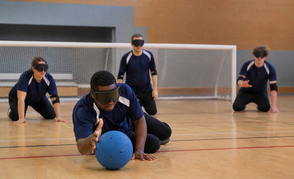 Goalball Team Warming Up in Community Gym