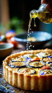 Eggplant and tomato pie with mozzarella served with olive oil at a local restaurant during dinner time