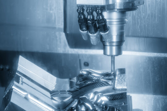 Mold and die rough cutting process on CNC milling machine with ball nose end mill tool in light blue tone
