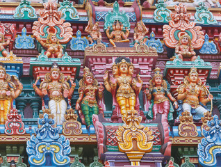 Fototapeta premium A sculptures on Hindu temple gopura (tower). Menakshi Temple, Madurai, Tamil Nadu, India