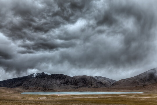 Scene featuring high dynamic range view of Himalayan lake Kyagar Tso, Ladakh, India
