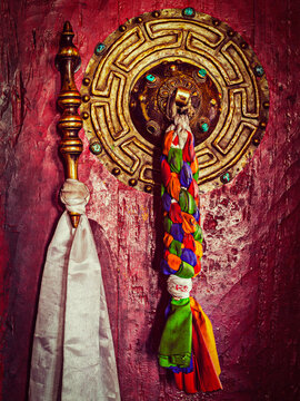 Vintage retro effect filtered hipster style scene of door handle of gate door of gompa - Tibetan Buddhist monastery. Diskit, Nubra valley, Ladakh, India