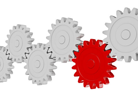 A teamwork success leadership cooperation partnership concept: gear cogwheels in row working together isolated on white