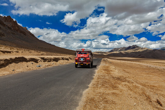 Scene featuring manali-Leh road in Indian Himalayas with lorry. More plains, Ladakh, India