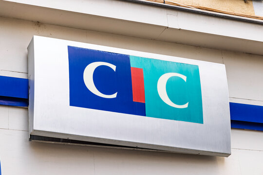 Macon, France - 01 August 2026 - Exterior sign board of CIC bank attached to a street building facade displaying logo.