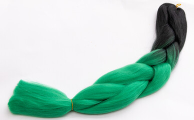 Long Braided Black and Green Ombre Hair Extension on White Background © YouraPechkin