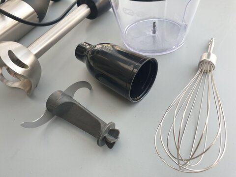 Immersion Blender Set with Whisk and Chopper Attachments on Gray Surface