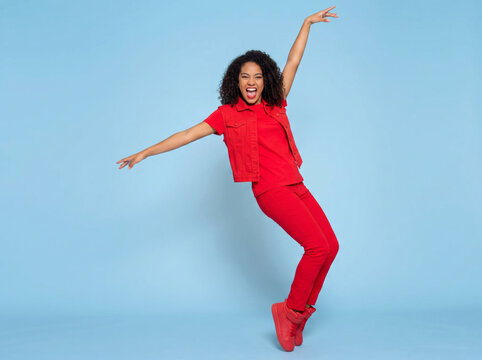 happy young woman dancing