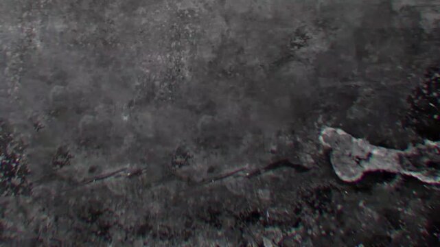 Vintage retro film grain texture overlay with glitch noise effect animation
