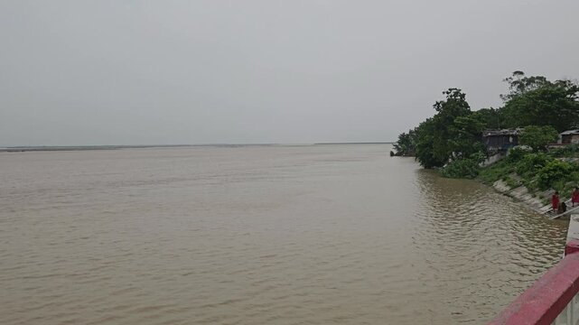 Kosi Barrage on the trans-boundary Kosi River near Bhimnagar at the Indo-Nepal border. Massive sluice gates and surrounding river landscape represent flood control, irrigation, water management