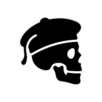 Profile view of black skull wearing beret for artistic dead concept.