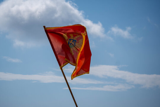 montenegro flag on the blue sky